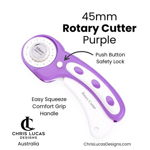 Purple 45mm rotary cutter with white squeeze handle and push-button safety lock at Chris Lucas Designs Australia