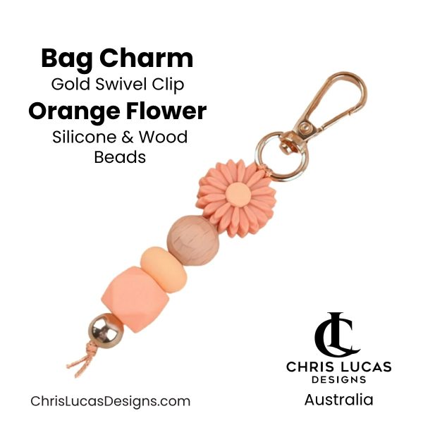Orange flower bag charm with gold swivel clip and silicone and wood beads for handbags and key rings
