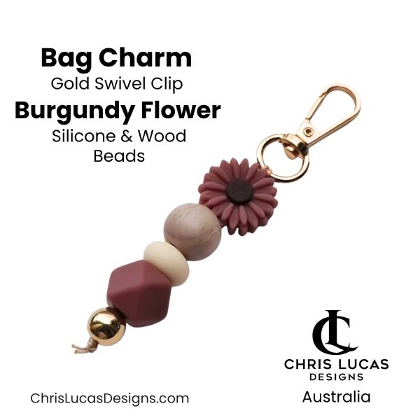 Burgundy flower bag charm with gold swivel clip and silicone and wood beads for handbags and key rings
